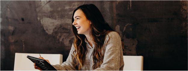 Person in office laughing