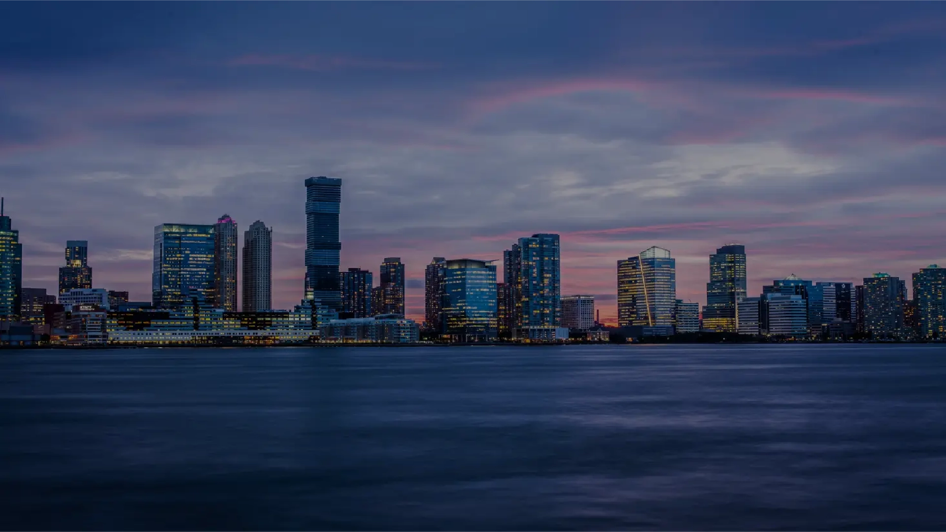 Home background image of night time city skyline