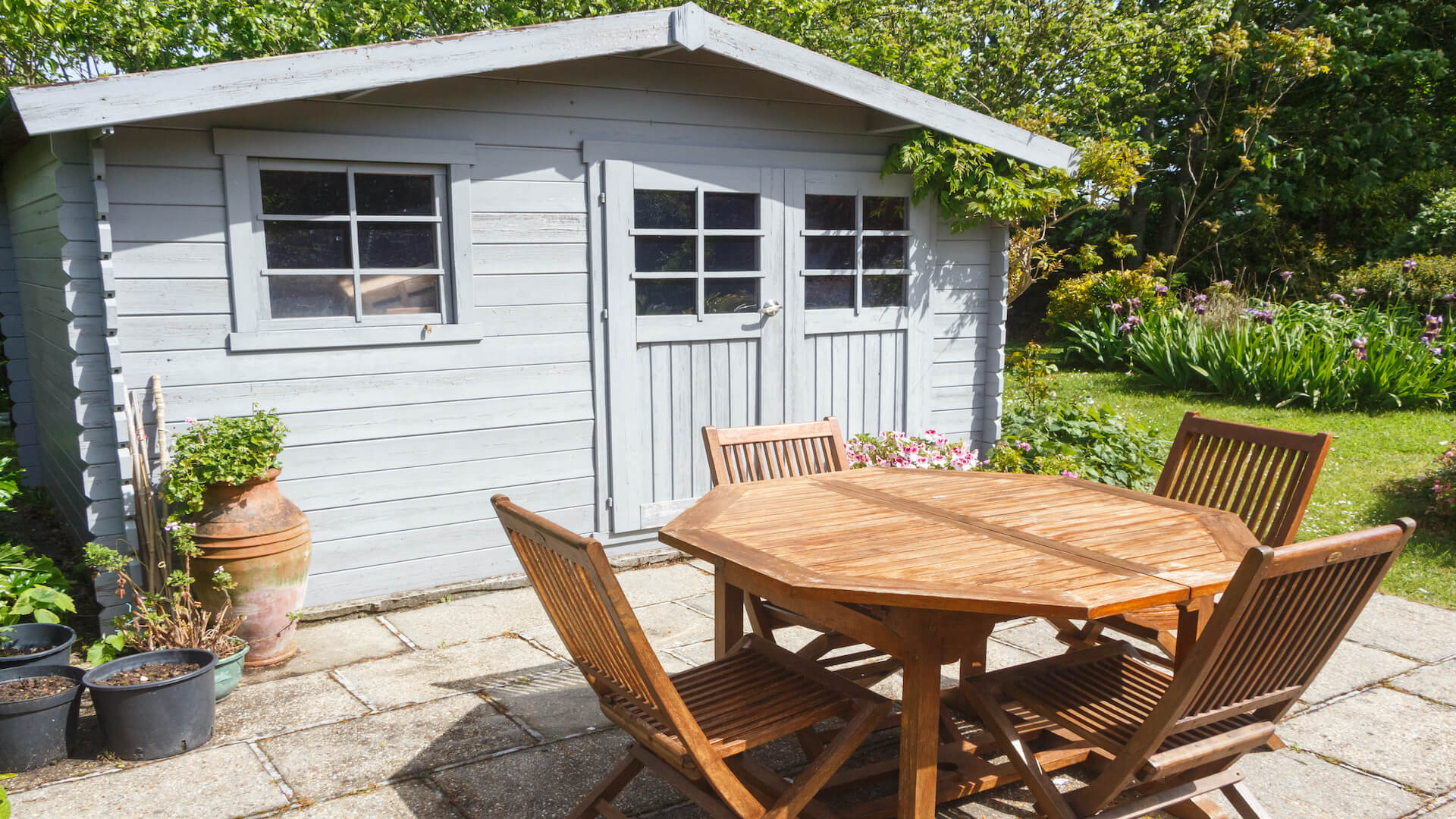 Shed with terrace and garden furniture