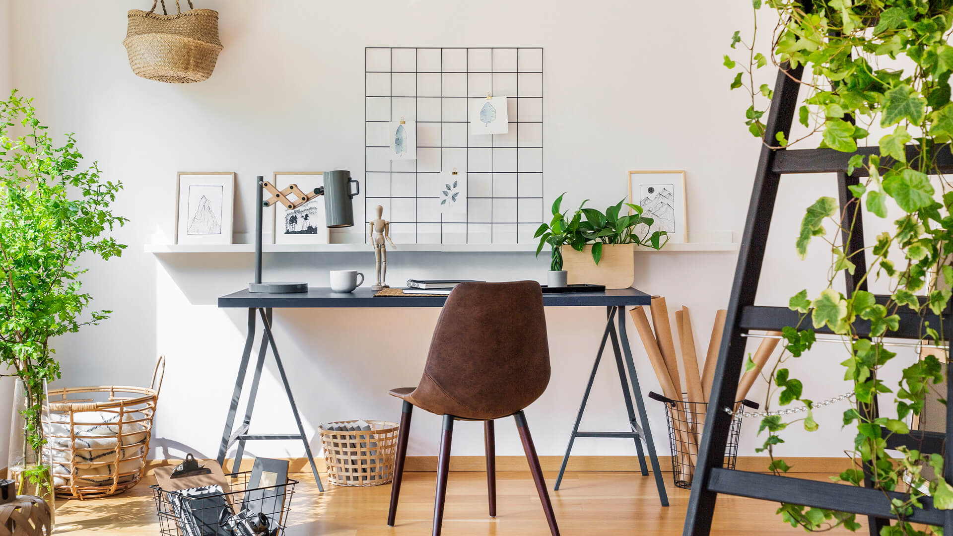 Home office space with plenty of plants