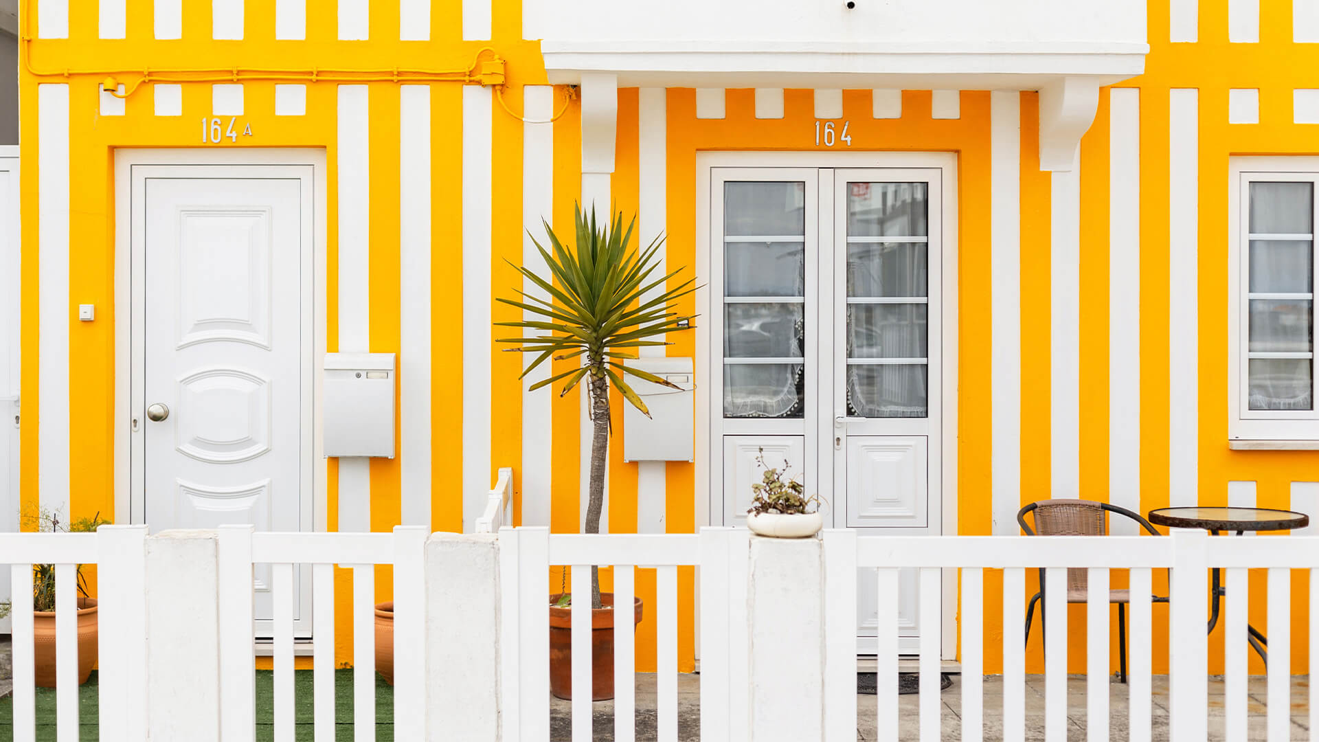 Yellow and white stripe house exterior