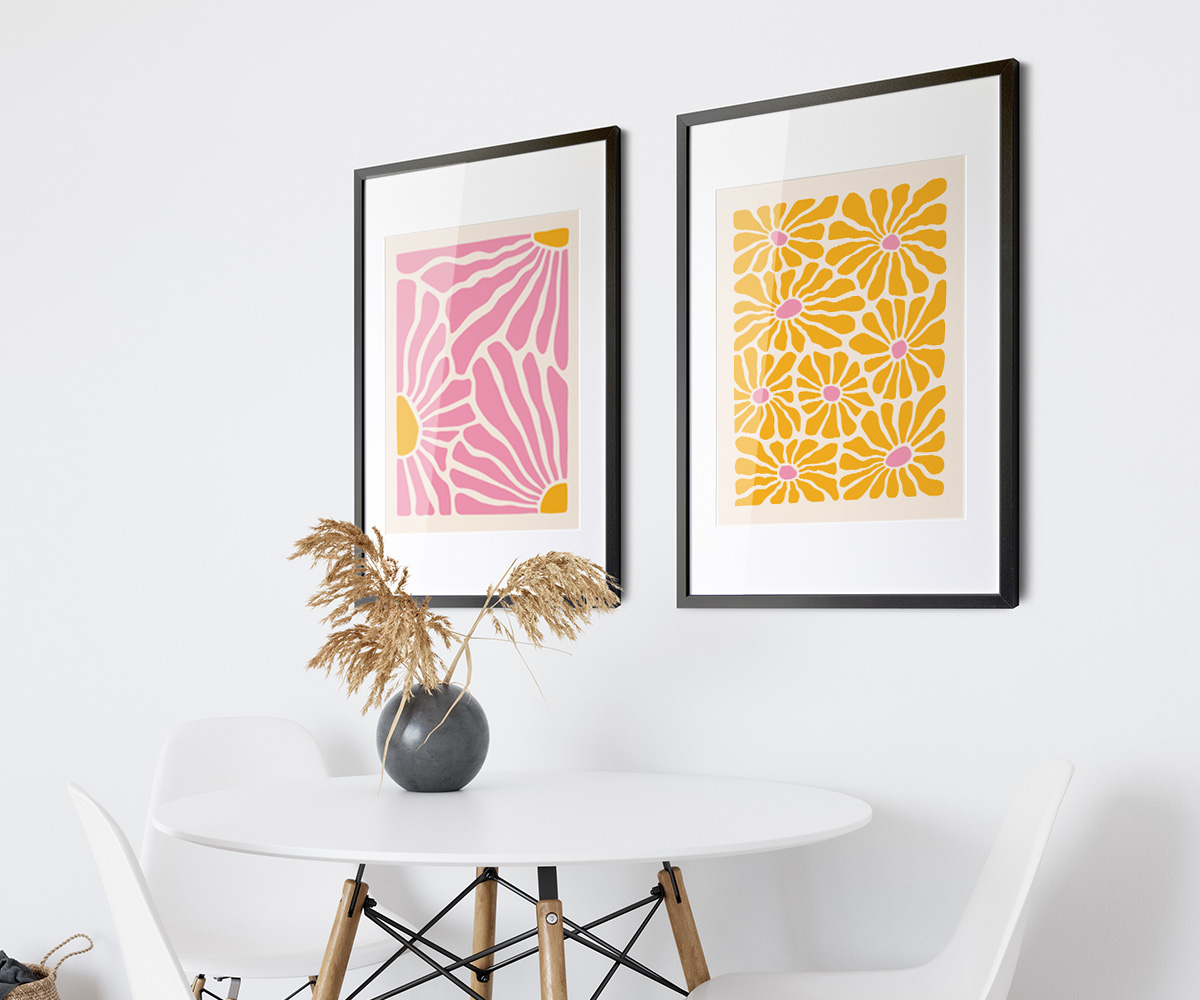 A table and chairs with a vase of flowers on it

Description automatically generated