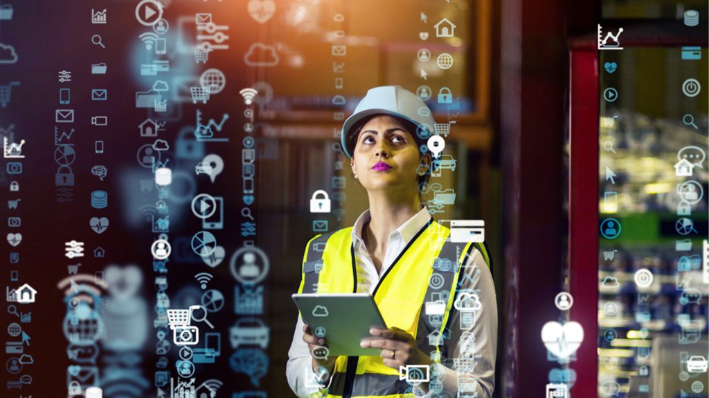 woman in hard hat looking up