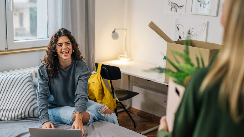 female college student move in dorm