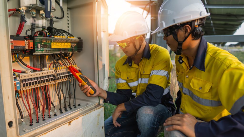 electricians cutting wire